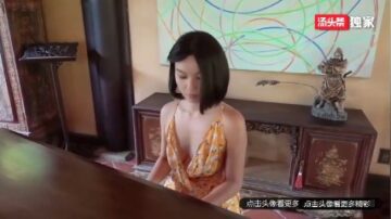 Pure goddess takes off her clothes and exposes herself naked next to the piano